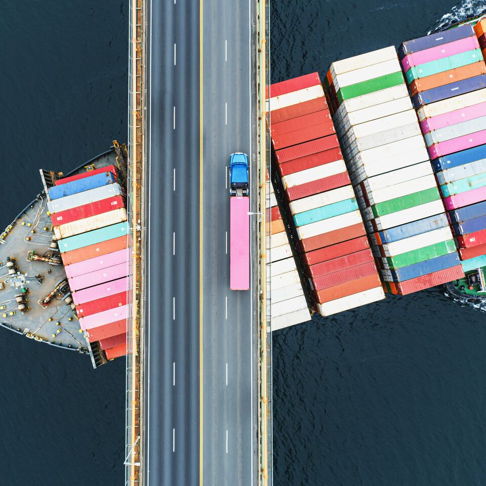 COLOUR-IMAGE_cargo-ship-and-truck_feb26