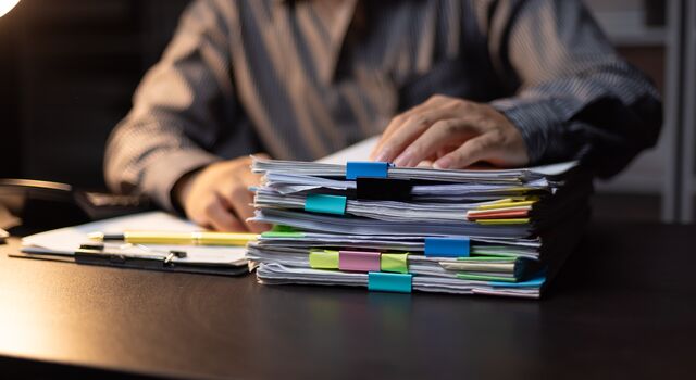 COLOUR-IMAGE_stack-of-papers-in-office_jun26