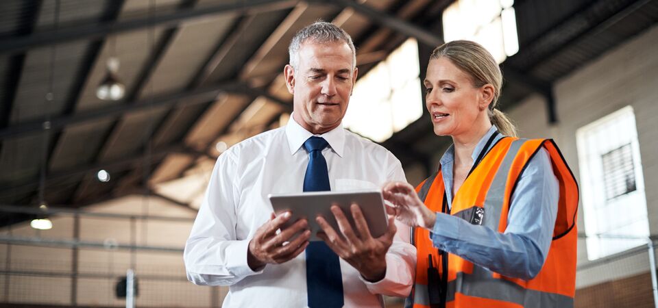 /bynder-asset/bynder:BE3980A8-1407-41A0-92422CEA4AB1DF46/Landscape_LG/COLOUR-IMAGE_two-colleagues-speaking-over-a-tablet_apr26.jpg?1776243913000