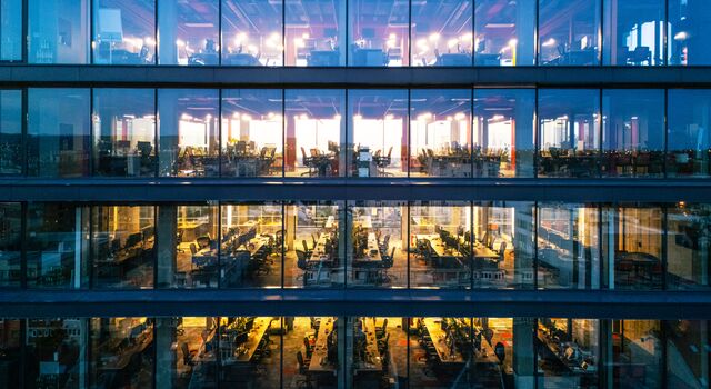 COLOUR-IMAGE_glass-windows-looking-into-office-floors-interior_jul26