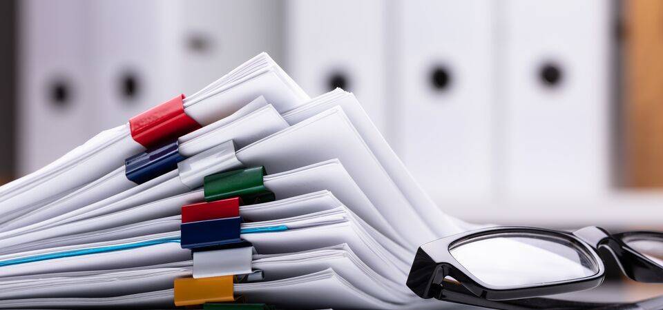 COLOUR-IMAGE_papers-and-glasses_feb26