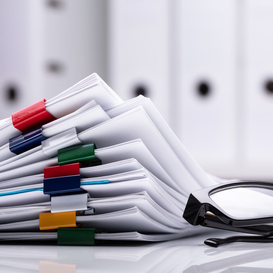 COLOUR-IMAGE_papers-and-glasses_feb26